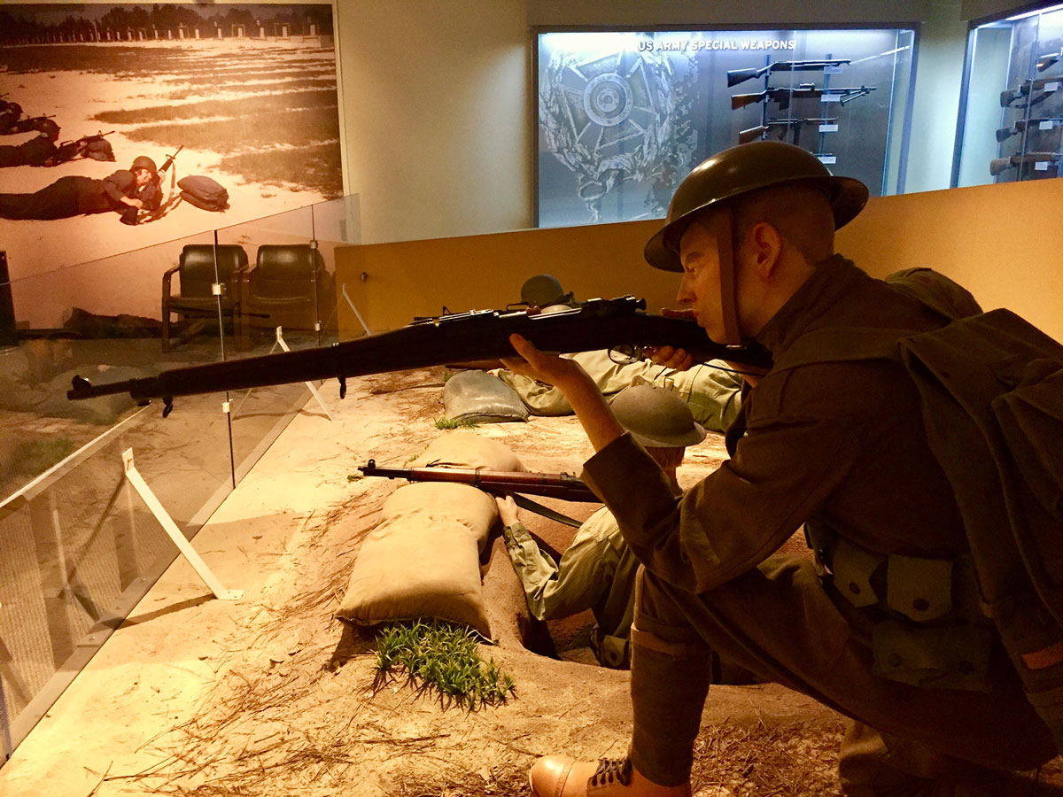 Mannequin soldiers with rifles as part of an exhibit inside the US Army Basic Combat Training Museum.